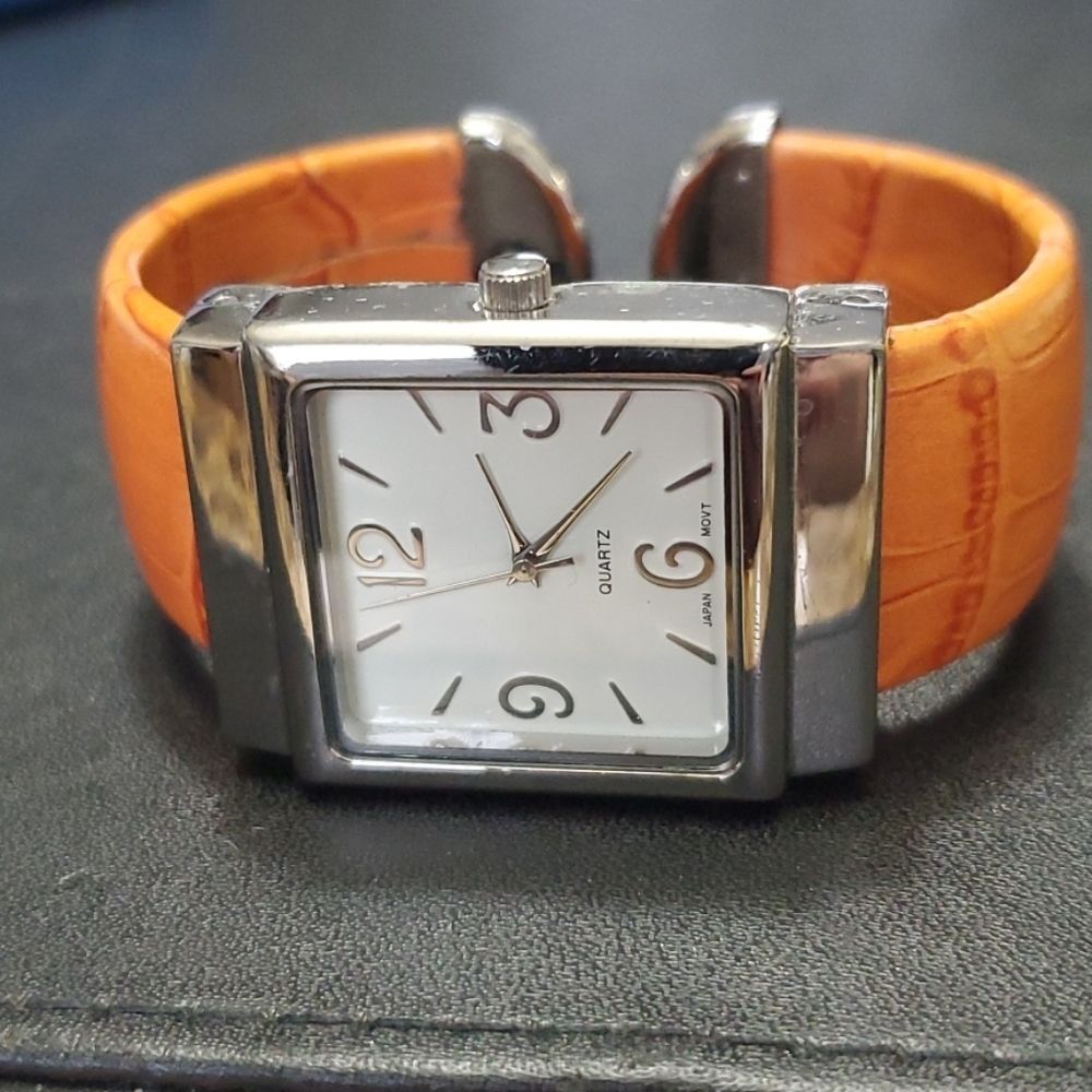 Avon wide cuff watch paprika silver tone IOB Needs Battery